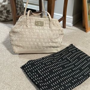 Pretty cream colored leather purse with dust bag